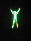 The man raises his arms